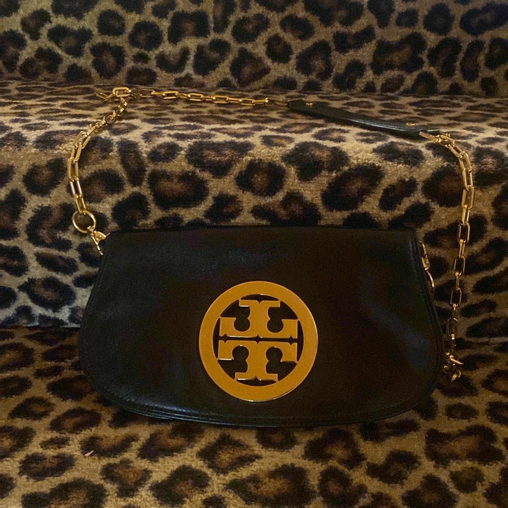 Tory Burch Designer clutch with gold chain and leather strap
